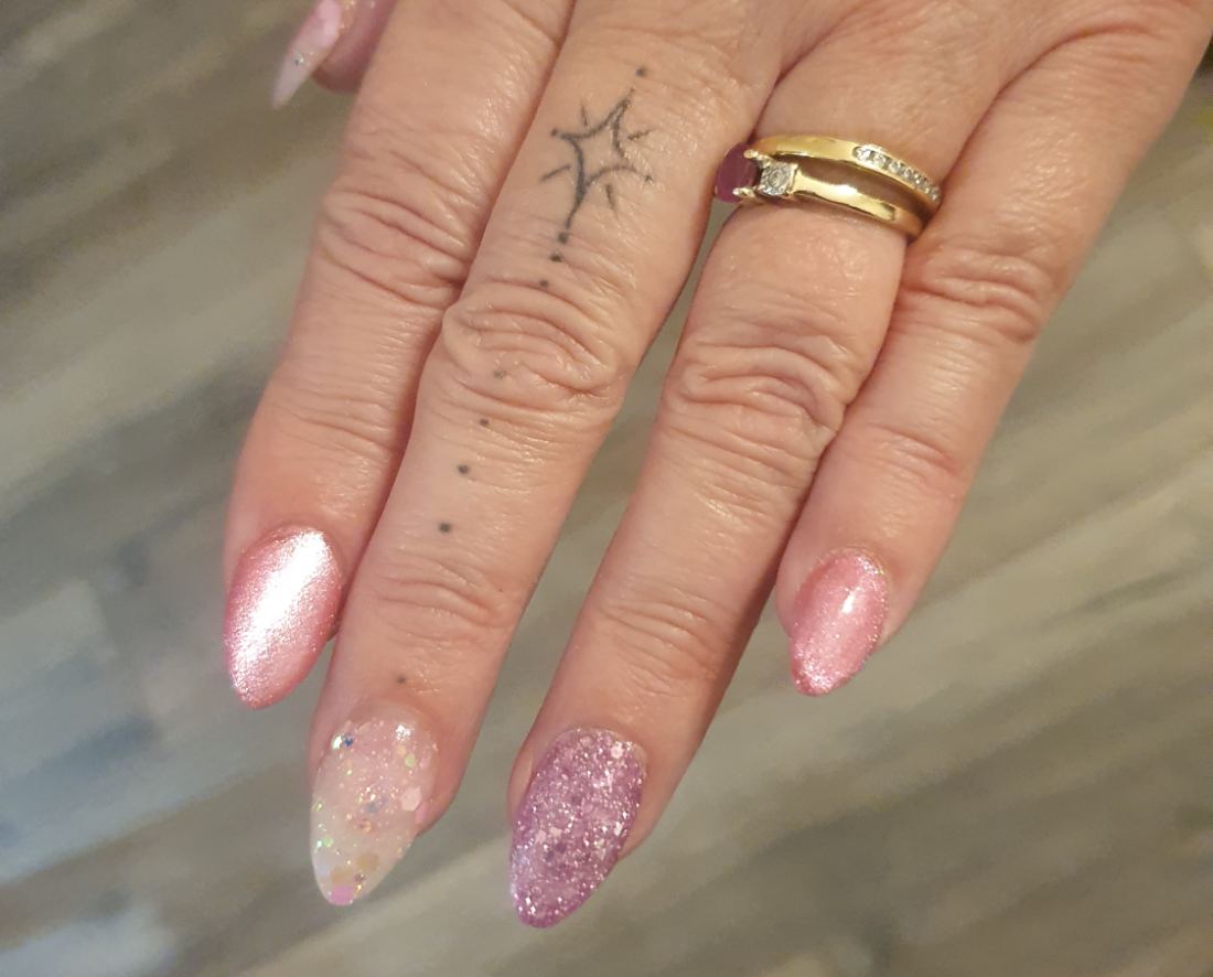 Pink and purple glitter gel nails